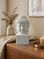 Bougie décorative Bouddha présentée dans une ambiance cadeau élégante