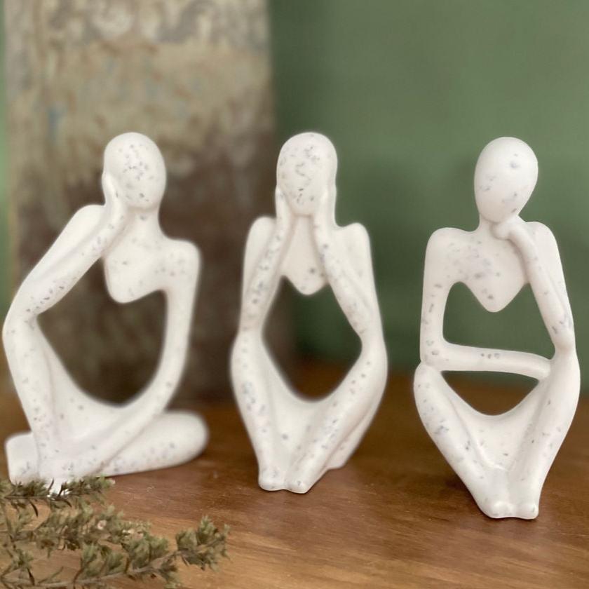 les trois sages – un message universel en trois statuettes artisanal