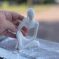 les trois sages – un message universel en trois statuettes fait main