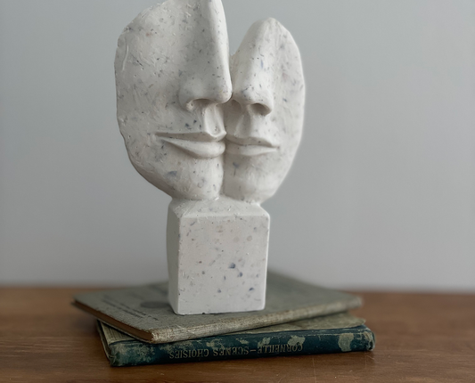 statue duo visage